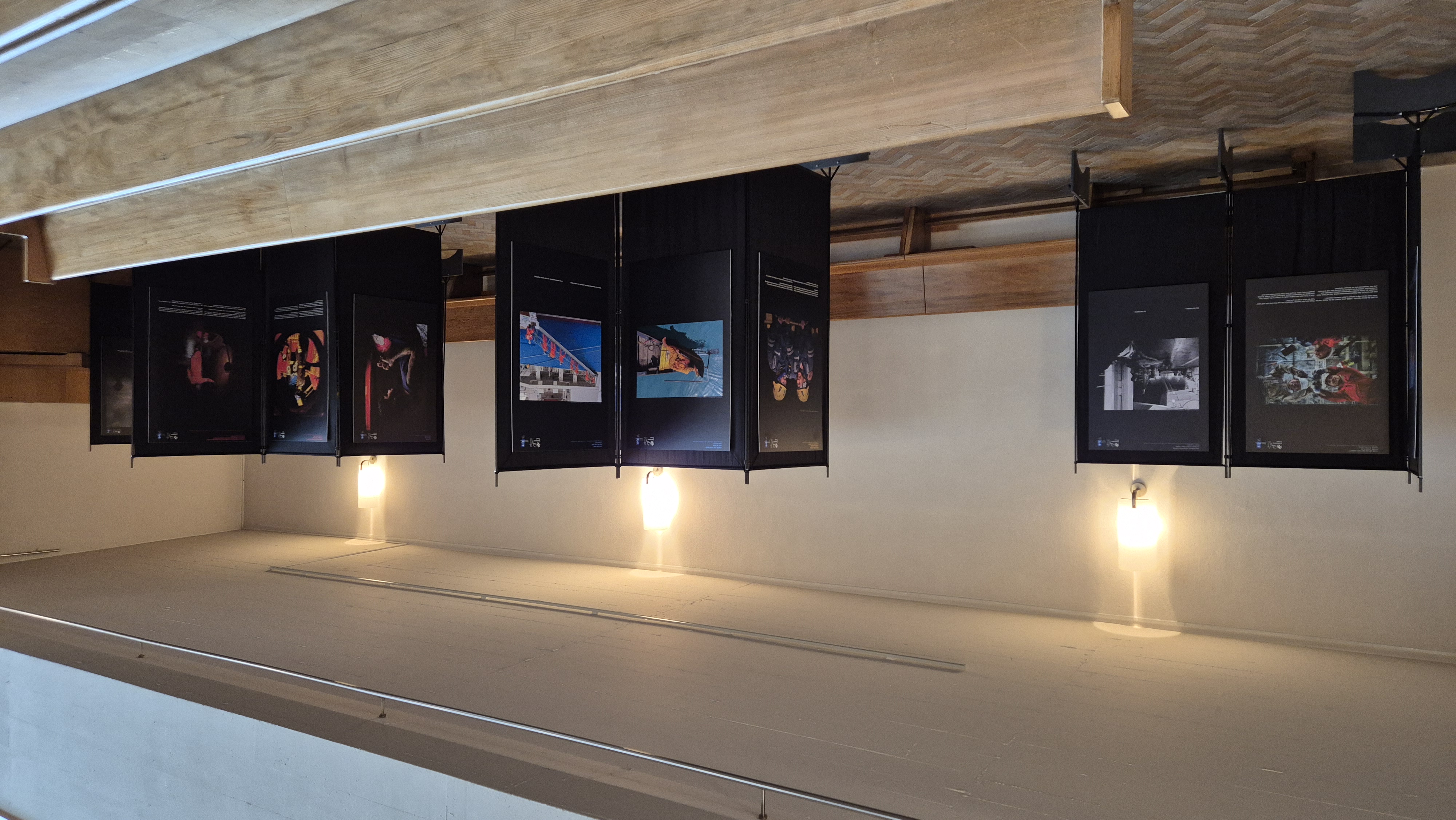 Life at Sea photographs and text exhibited in large metal stands