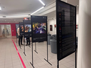 Life at Sea photographs and text exhibited in large metal stands