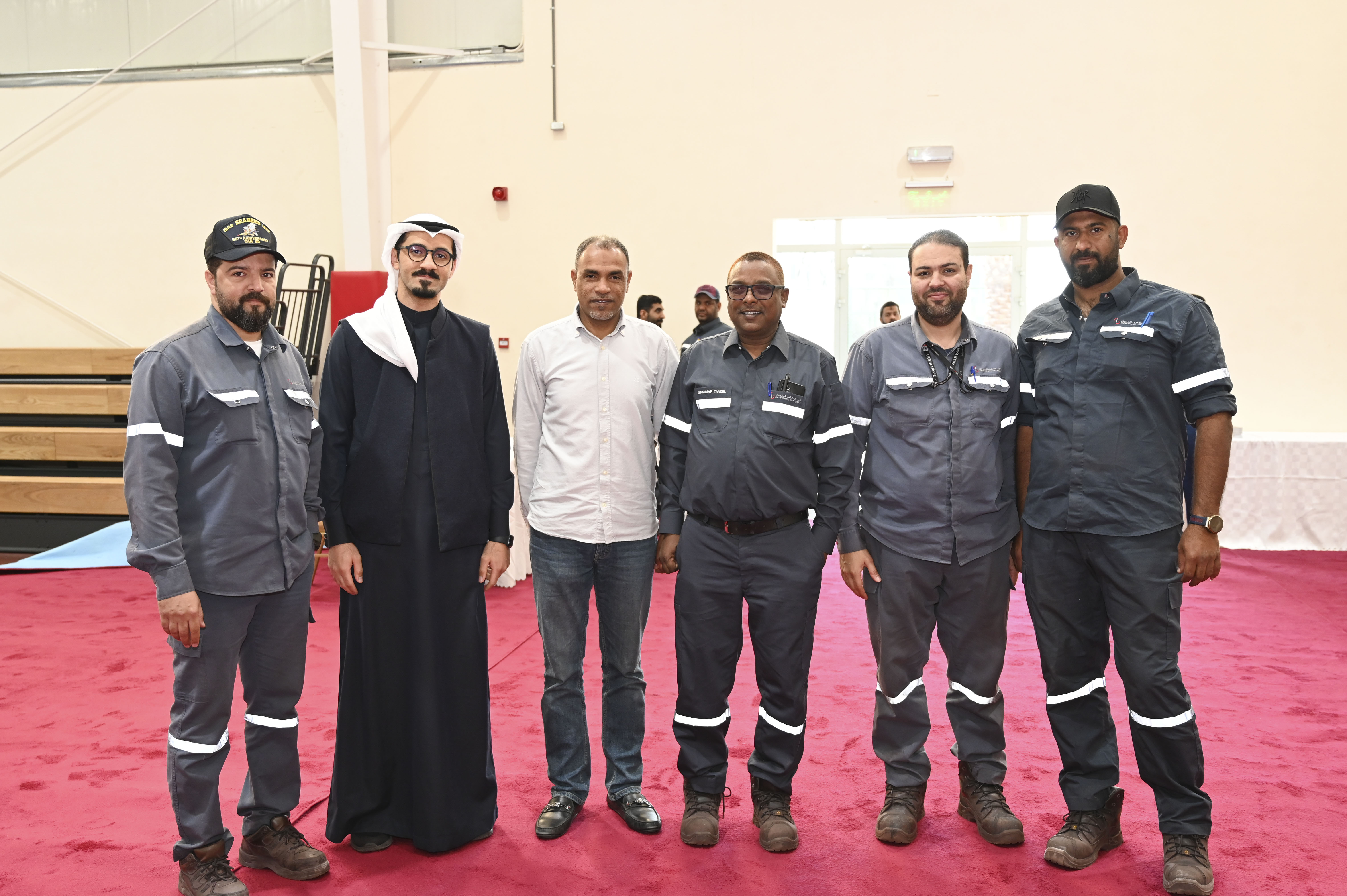 Mohamed Hasan Jasim Neama and 5 Foulath Union colleagues at the event